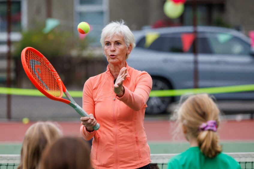 Judy Murray demonstrating a serve at Fossoway tennis club.