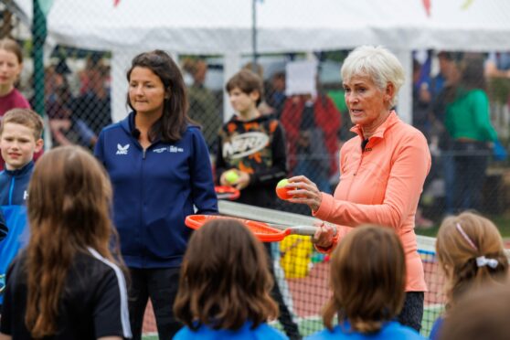 Alessia Palimieri and Judy Murray coaching a group of youngsters at Fossoway tennis club.