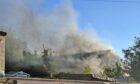 Smoke over the old scrapyard in Leven. Image: Margaret Eaves/Facebook