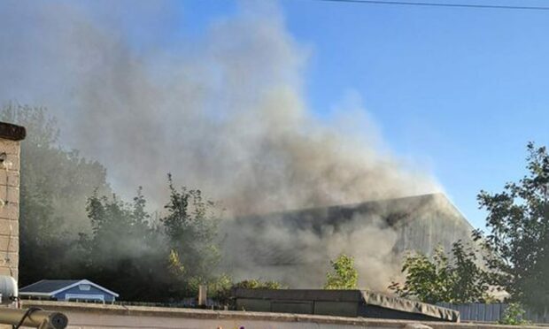 Smoke over the old scrapyard in Leven. Image: Margaret Eaves/Facebook
