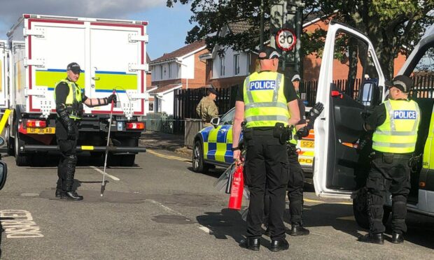 Police and a bomb disposal unit on Ambleside Avenue in Kirkton, Dundee