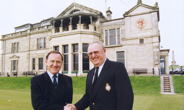 Sir Michael Bonallack (right) with Peter Dawson, who succeeded him as secretary, outside The R&A clubhouse in St Andrews in 1999.