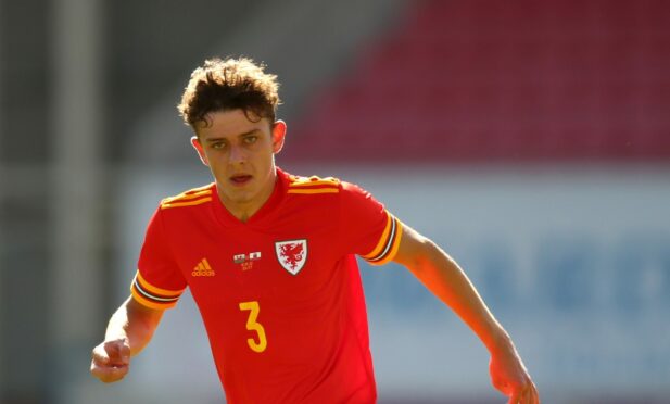 Owen Beck in action for Wales U/21s. Image: PA