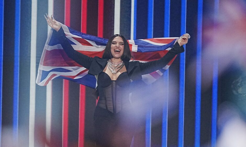 United Kingdom entrant Mae Muller during the opening of the grand final for the Eurovision Song Contest final at the M&S Bank Arena in Liverpool. Picture date: Saturday May 13, 2023.