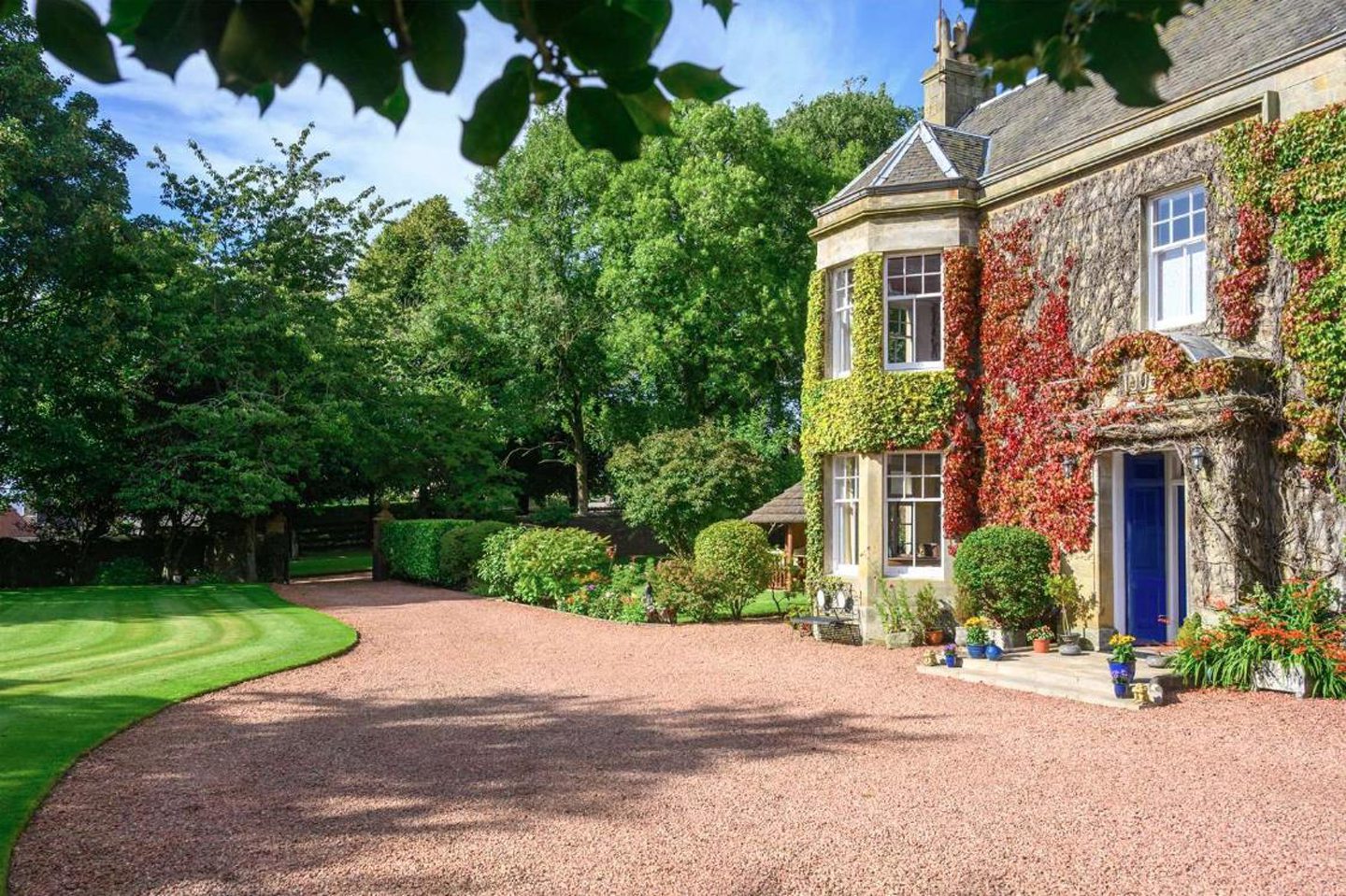 A driveway leading to the front of Park House