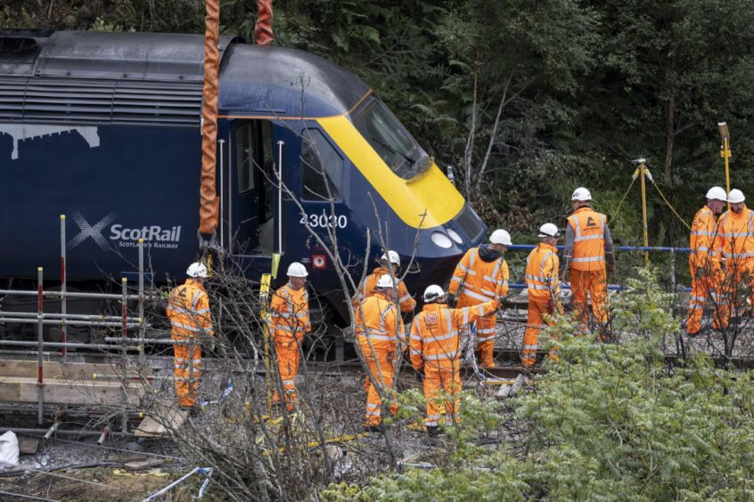Workers at the Stonehaven rail crash site