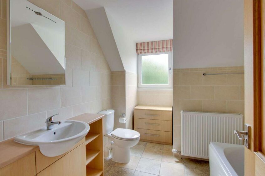 Upstairs there is a spacious family bathroom