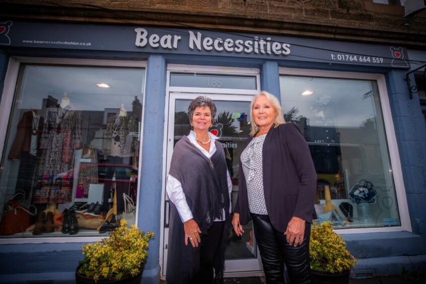 Estelle Nicol, left, chatting with Auchterarder shopkeeper Maggie Robin outside her boutique, Bear Necessities.