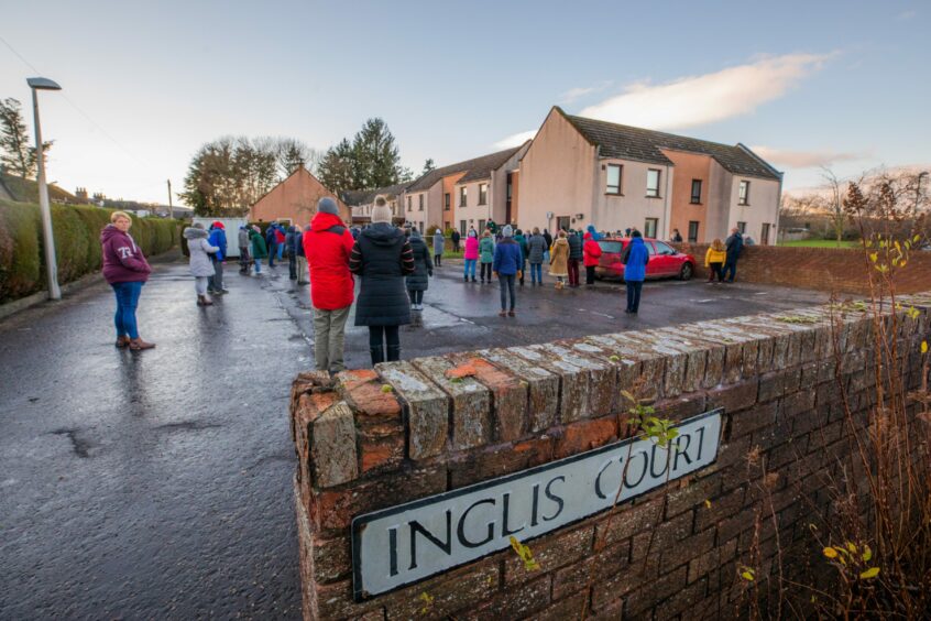 Community council chairman Gus Leighton rallied locals at a public meeting outside Inglis Court in November 2021.