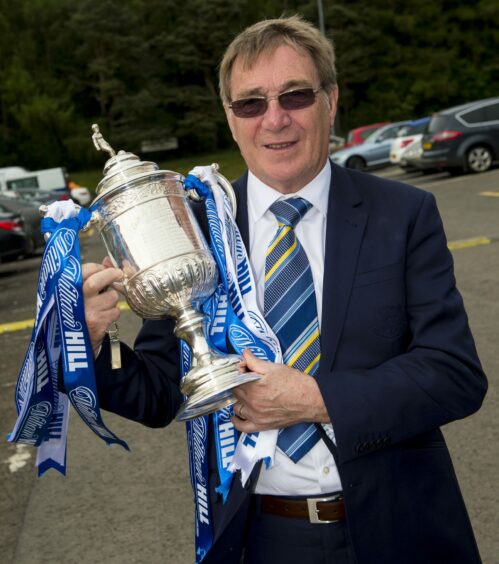 Geoff Brown holding the trophy after St Johnstone won the Scottish Cup for the first time.