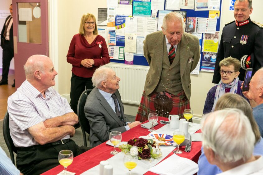 King Charles speaking to OAPs at Kinross day centre