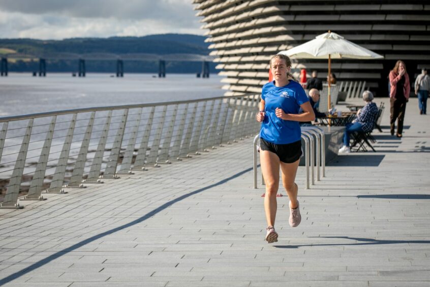 A runner at Dundee Waterfront in the warm weather