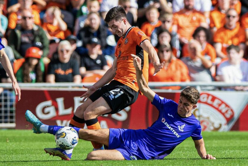 Declan Glass attempts to burst forward for Dundee United against Airdrieonians 