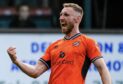 Louis Moult celebrates Dundee United's win over Airdrieonians