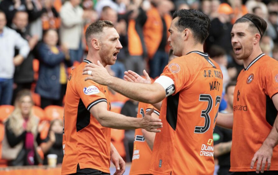 Louis Moult celebrates a goal for Dundee United against Morton. 
