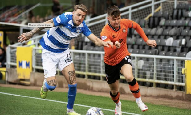 On-loan Dundee defender Tyler French hares after Dundee United winger Glenn Middleton.