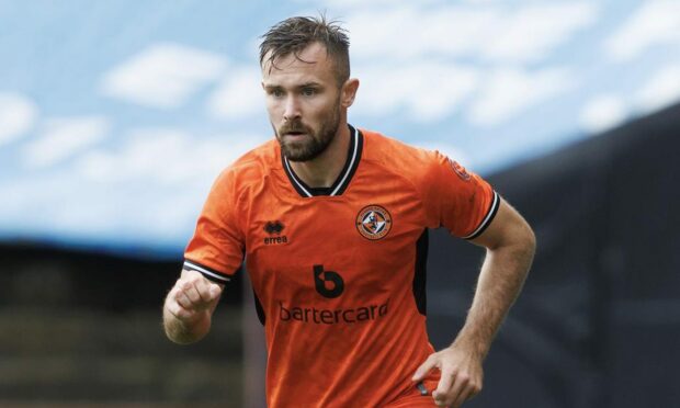 Scott McMann in action for Dundee United