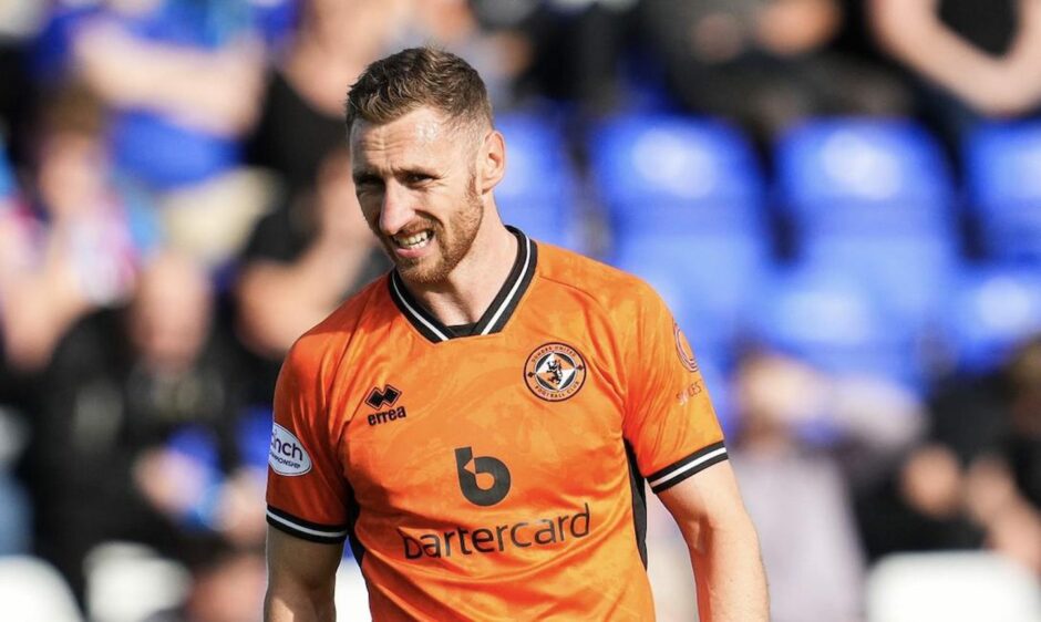 Louis Moult in action for Dundee United against Inverness