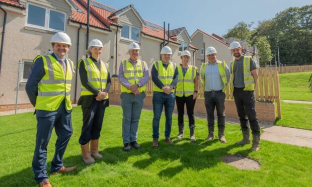 Representatives from Kingdom Housing Association, Campion Homes and the Universtiy of St Andrews at the site.