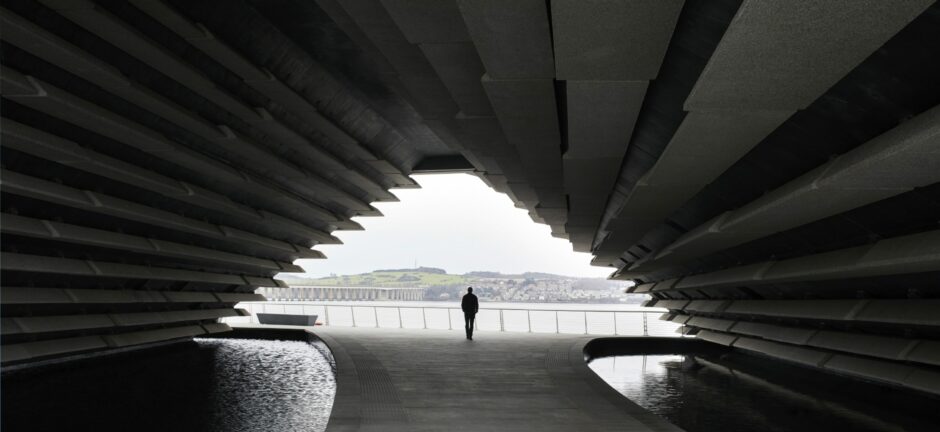 The outside of V&A Dundee with the river Tay in the background.