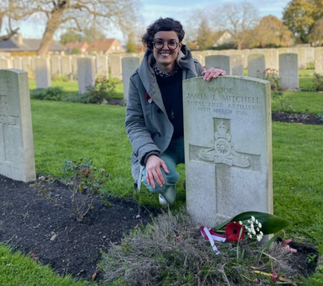 Marijke Vandevyvere at the grave of Perthshire First World War soldier Major James Mitchell from Pitlochry in Flanders. 
