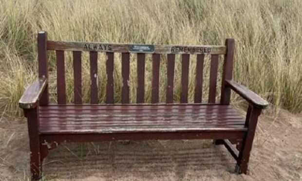A memorial bench thrown into the Tay by Dundee vandals washed up at Buddon. Image: ACE