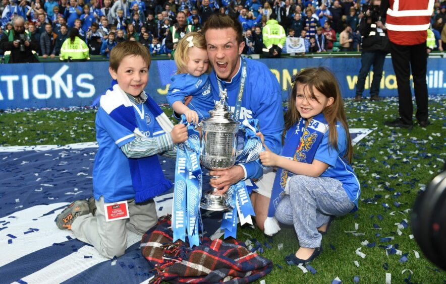 Chris Millar celebrates the St Johnstone 2014 cup win with his family.