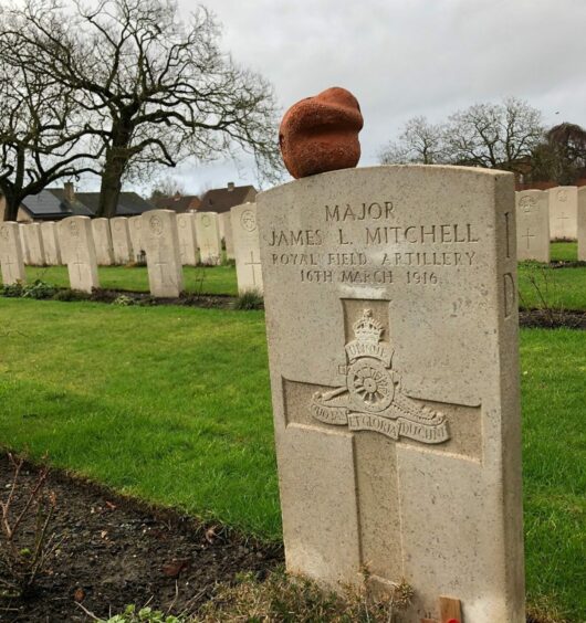 The grave of First World War soldier Major James Mitchell in Flanders.