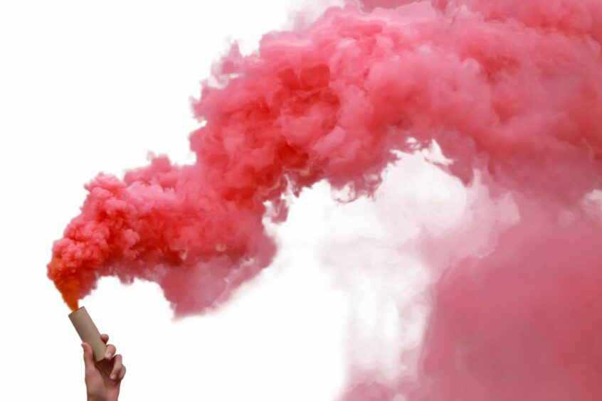Red smoke bomb