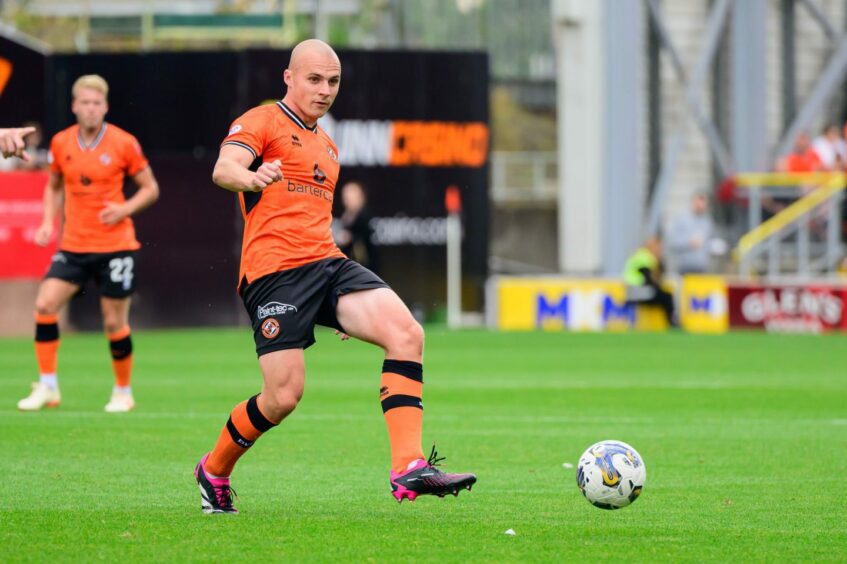 Liam Grimshaw in possession for Dundee United