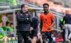 Dundee United's Mathew Cudjoe, right, trudges from the field on Saturday
