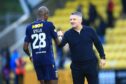 Dundee boss Tony Docherty with Mo Sylla. Image: David Young/Shutterstock