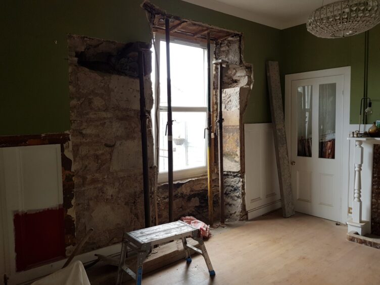 Before: The family decided to install French doors in the dining room.