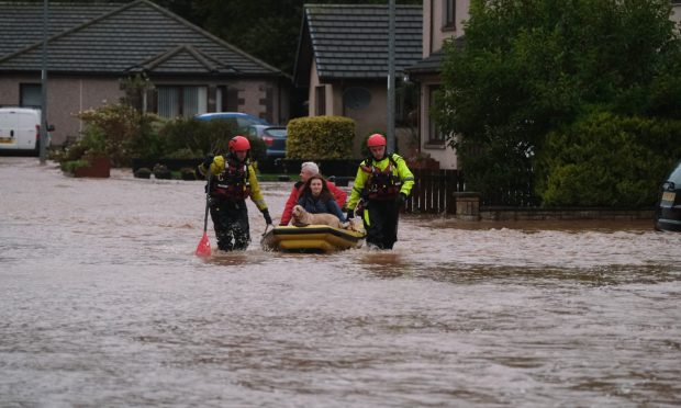 Brechin residents were rescued by boat during Storm Babet.  Image: Paul Reid