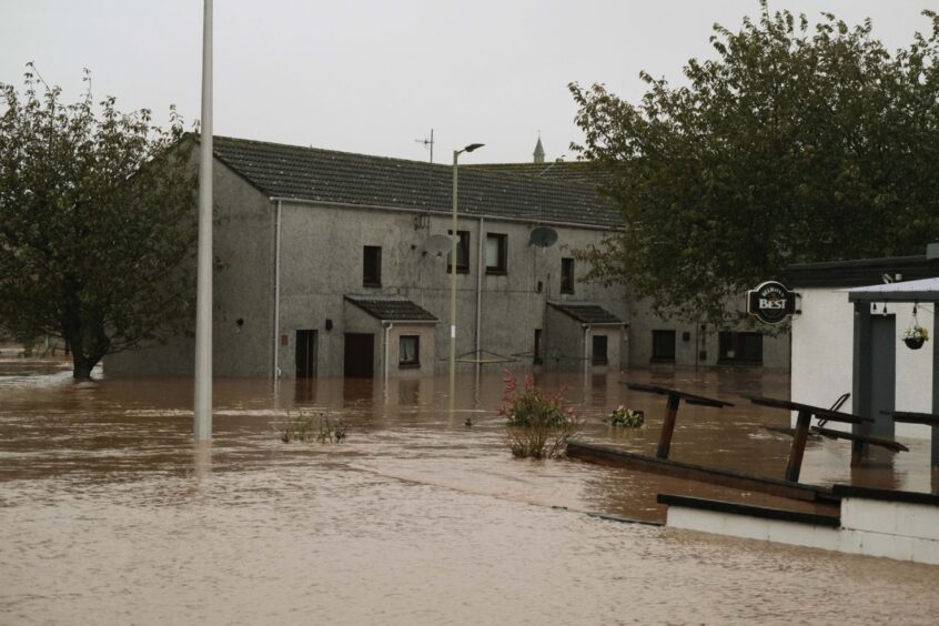 Water levels go up past doors to homes and pubs in Brechin.