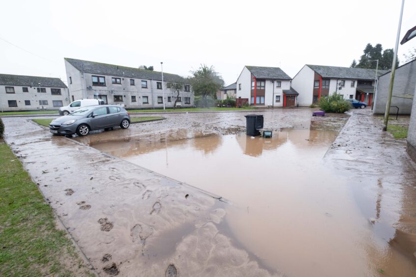 A flooded car park, amid the aftermath of the storm in Brechin. Image: Paul Reid.