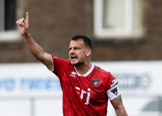 Dunfermline Athletic captain Kyle Benedictus in action earlier in the season. Image: SNS.