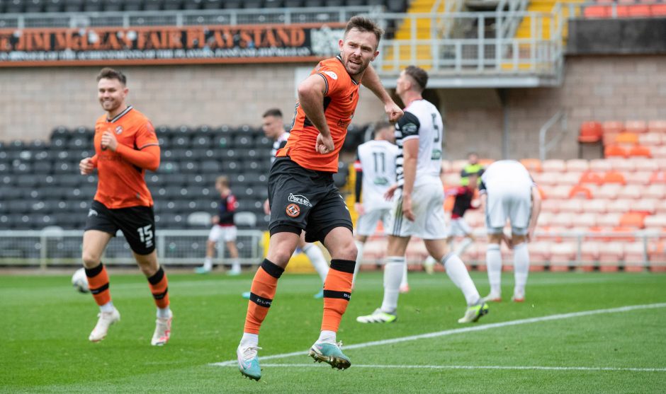 Scott McMann celebrates his first ever Dundee United goal
