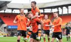 Dundee United players assemble to hail Scott McMann