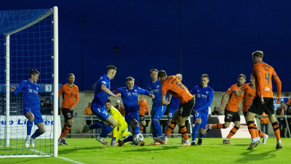 Ross Graham in action for Dundee United at Peterhead. 