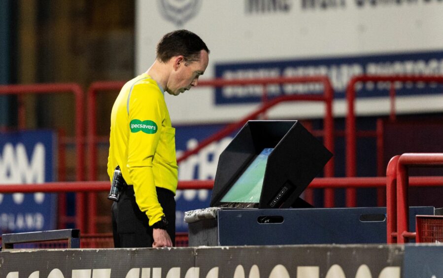 Colin Steven rules on Ross County's disallowed goal. Image: SNS