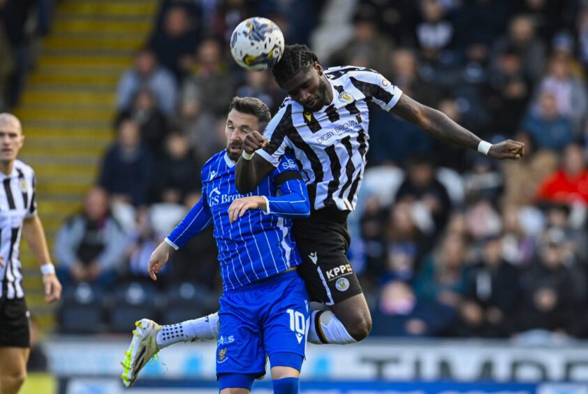 Nicky Clark and St Mirren's Richard Taylor in action. 