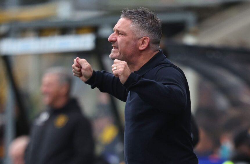 Tony Docherty in the dugout at Livingston. Image: SNS