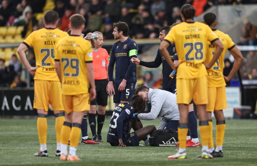 Malachi Boateng receives treatment at Livingston. Image: SNS