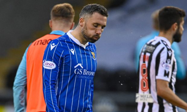 A dejected St Johnstone striker Nicky Clark at full-time after the last game in Paisley.