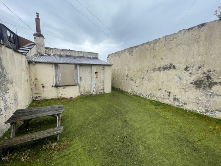 The rear garden area of the house. Image: Auction House Scotland