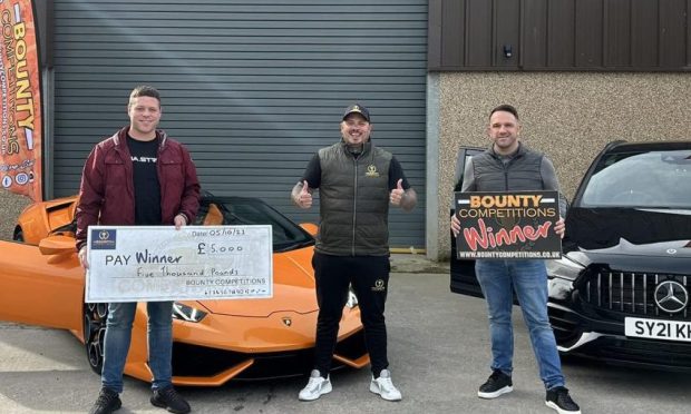Ian Reynolds, Bounty Competitions director Calvin Davidson and Ryan Walton with their new cars