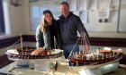 Lesley and Paddy Murphy presented the models to Arbroath lifeboat station. Image: Arbroath RNLI