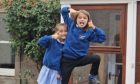 Arthur and Margot Tracey in school uniform