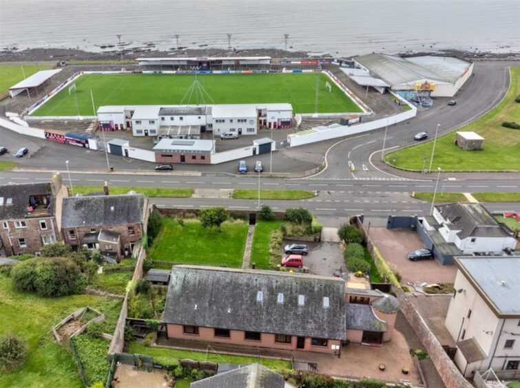 The angus home with panoramic views is adjacent to Arbroath's Gayfield Stadium.